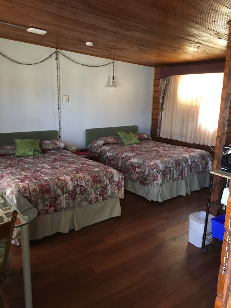 cabin style room with 2 double beds